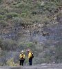 El sábado, las fuertes lluvias permitieron a los bomberos controlar otro incendio que provocó la muerte de dos personas y quemó 11.300 hectáreas. (Foto: AFP/Frederic Brown)