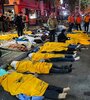 Hileras de cadáveres en las calles de Seúl tras la estampida. (Fuente: AFP)