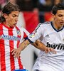 Filipe Luis y Di María en un partido entre Atlético de Madrid y Real Madrid.