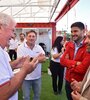 El gobernador y el ministro Puccini en diálogo con productores en Expoagro.