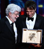 George Lucas le entregó a Sean Baker la Palma de Oro del Festival de Cannes. (Fuente: AFP)