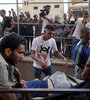Trasllado de heridos a un hospital tras un bombardeo en la Franja de Gaza. (Fuente: AFP)