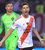 Ignacio Fernández y Juan Pablo Carrizo, vencedor y vencido en el primer gol de la noche. (Fuente: Télam)