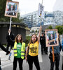 El grupo de los descolgadores de retratos de Macron denuncia “el vacío de la política climática y social”. (Fuente: AFP)