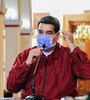 Maduro en tiempos de coronavirus, en el palacio de Miraflores. EE.UU. lo acusa de narcoterrorista. (Fuente: AFP)
